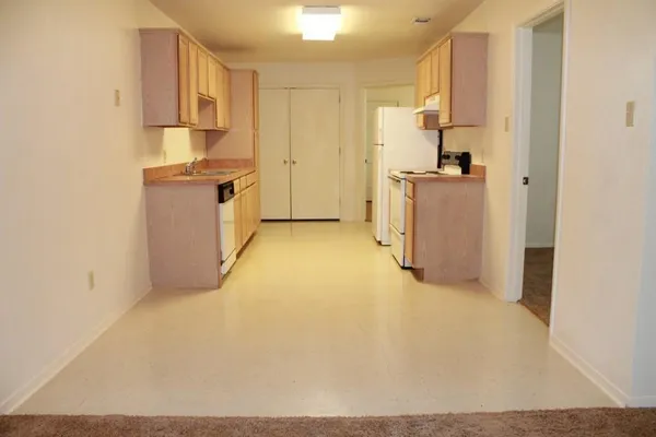 a view of a kitchen with a sink