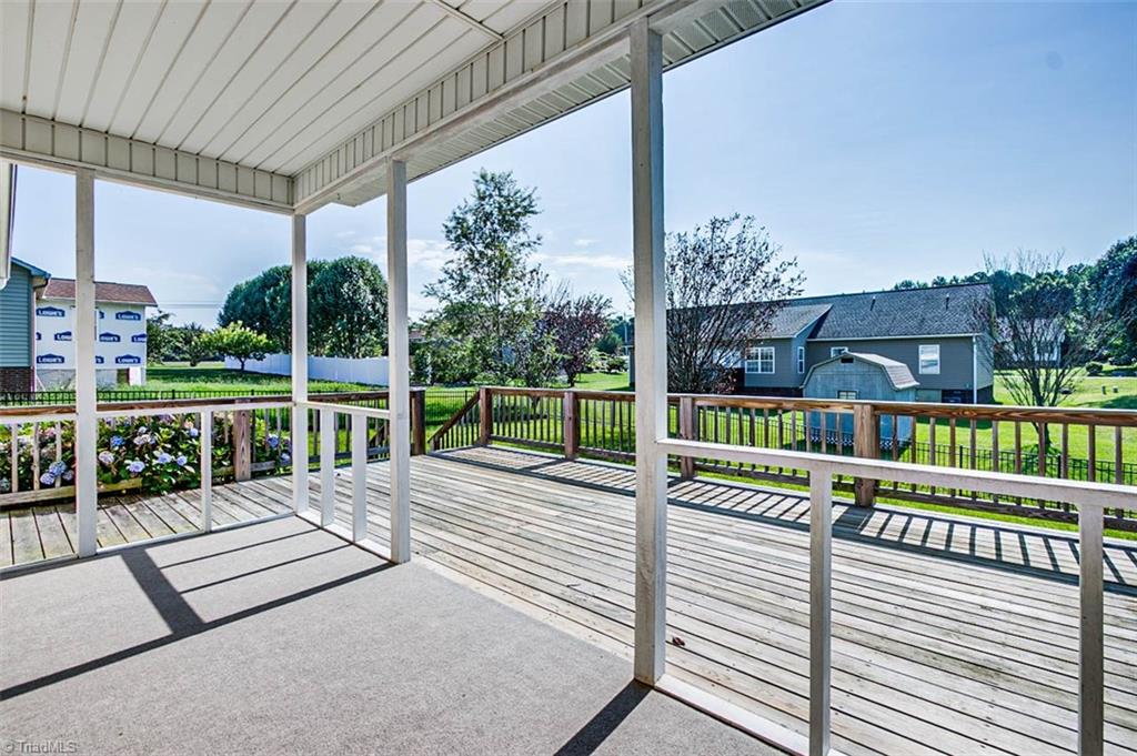 2813 Horseshoe Bend Road Randleman, NC 27317 - Photo 21 of 24 Covered back porch & nice deck