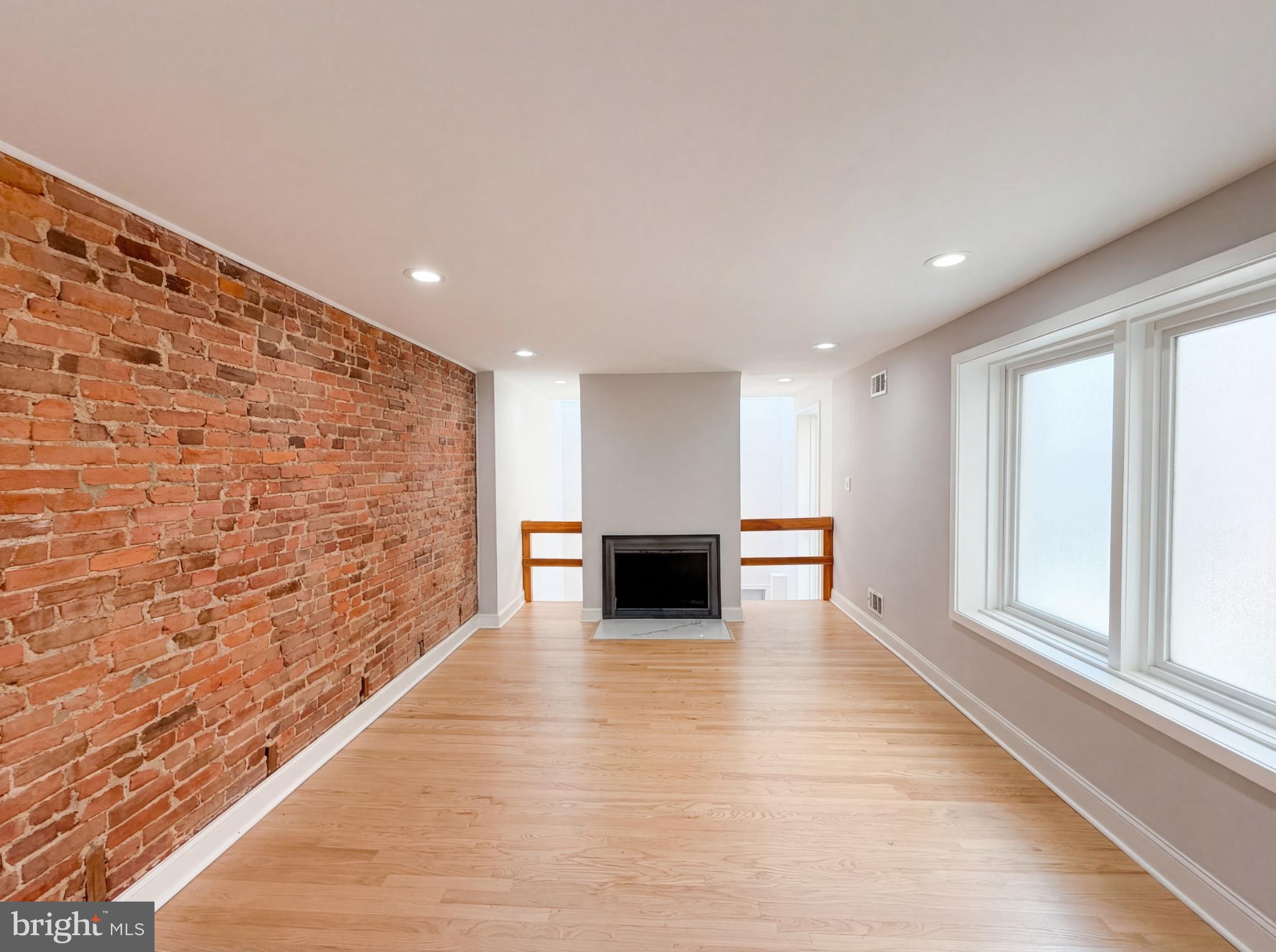 724 13th Street Northeast Washington, DC 20002 - Photo 3 of 20 Chic urban retreat with exposed brick.