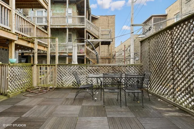 front view of a house with a bench