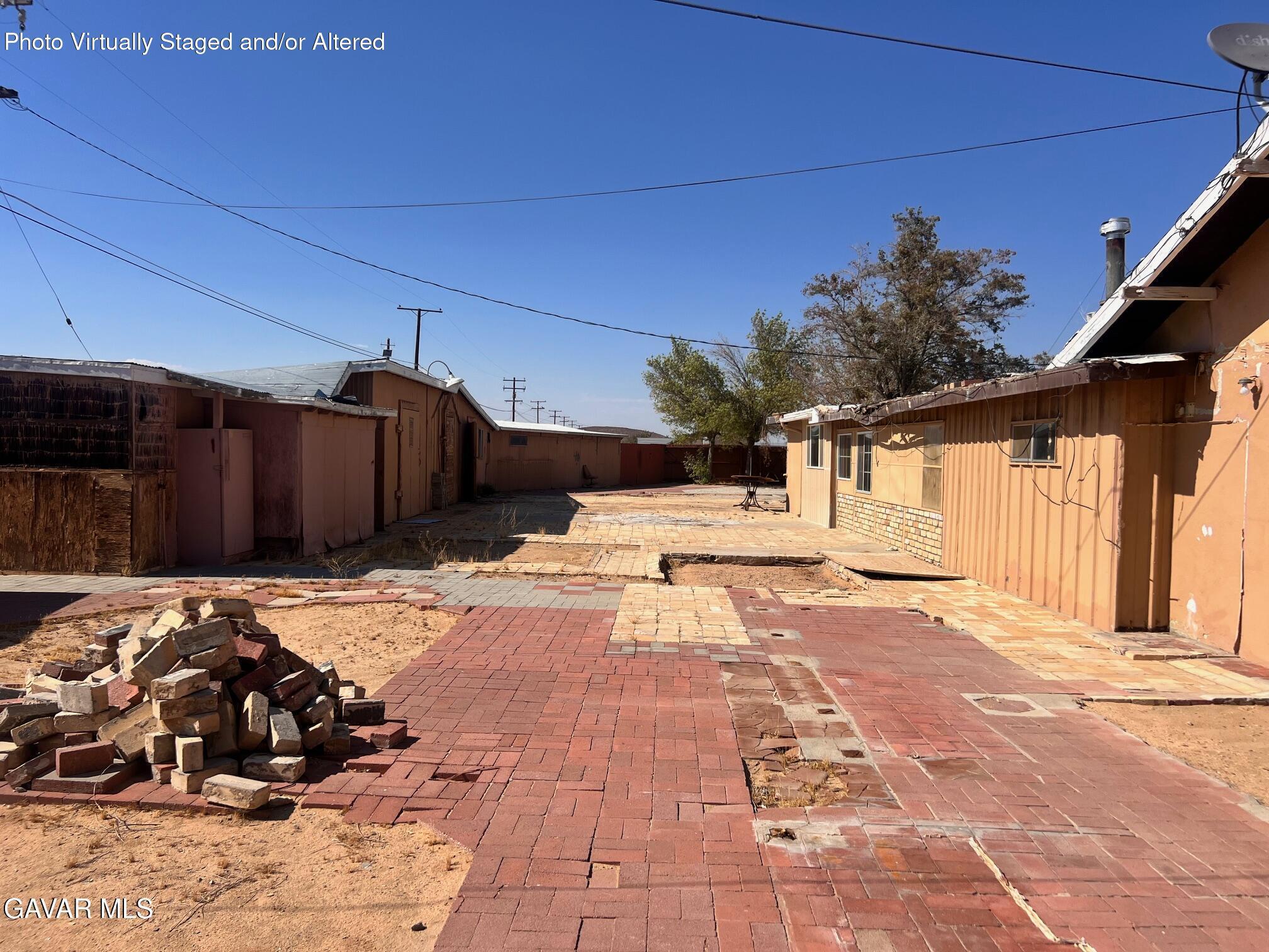 13227 Flint Street North Edwards, CA 93523 - Photo 14 of 84 a view of a house with backyard and a patio