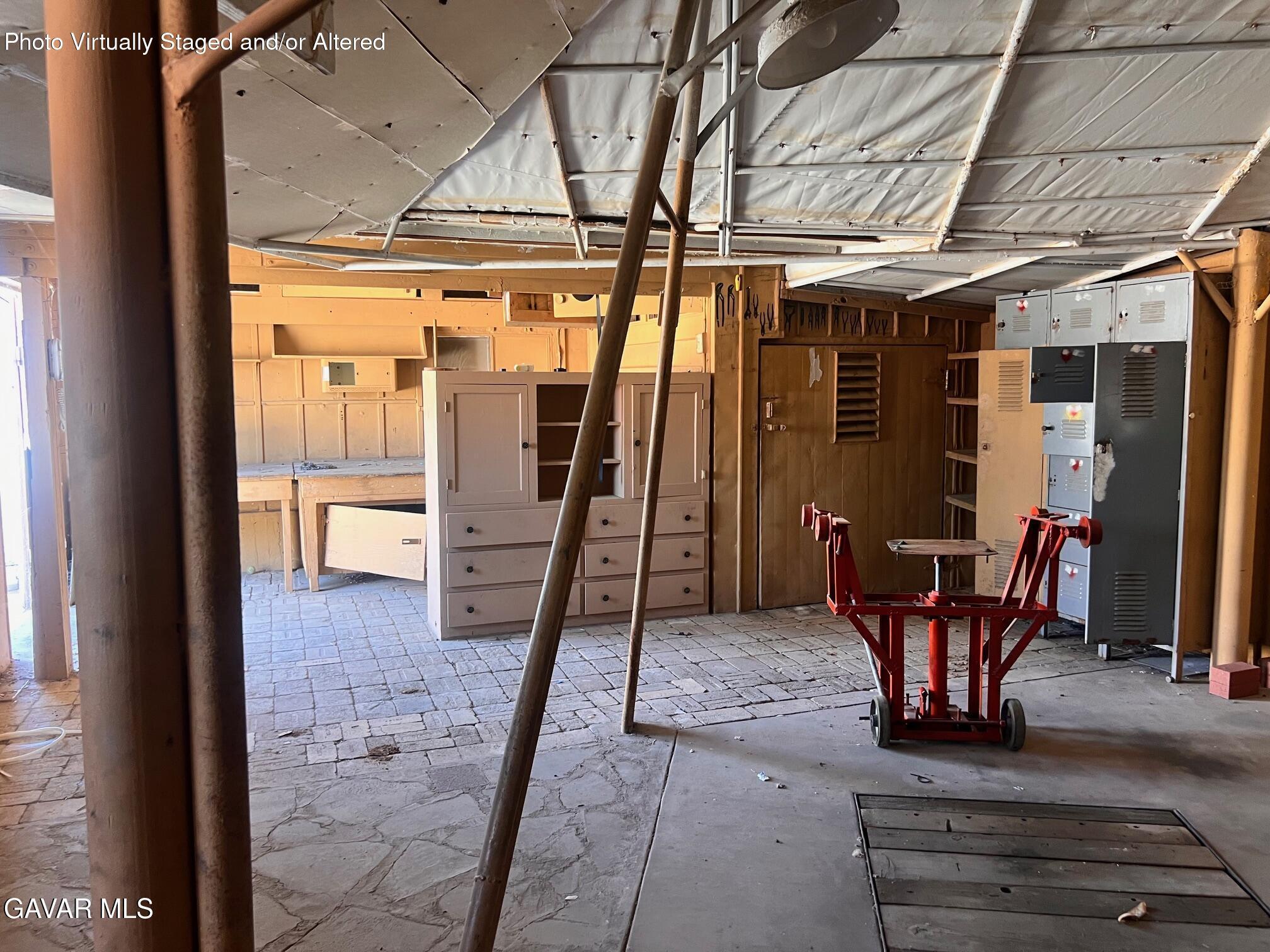 13227 Flint Street North Edwards, CA 93523 - Photo 18 of 84 a view of a porch with a table and chairs