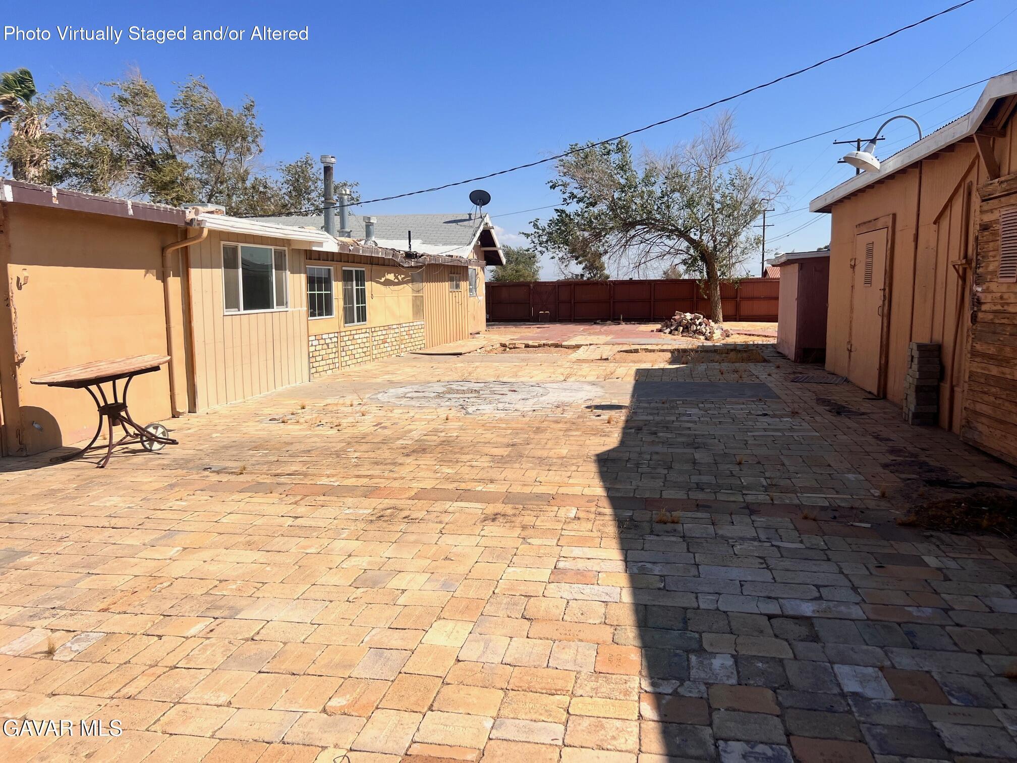 13227 Flint Street North Edwards, CA 93523 - Photo 30 of 84 a view of a house with a snow in the yard