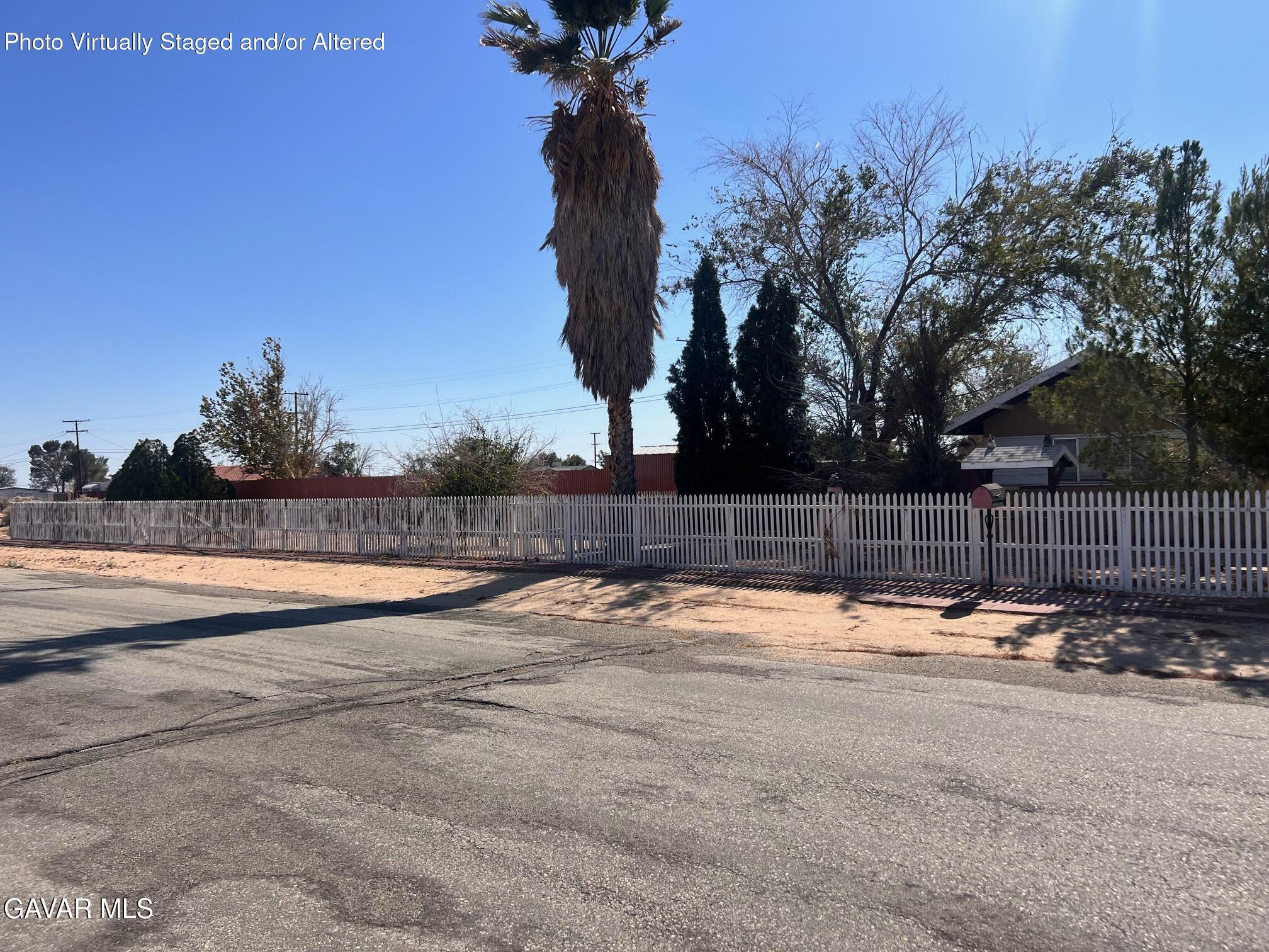 13227 Flint Street North Edwards, CA 93523 - Photo 3 of 84 a backyard of a house with lots of green space