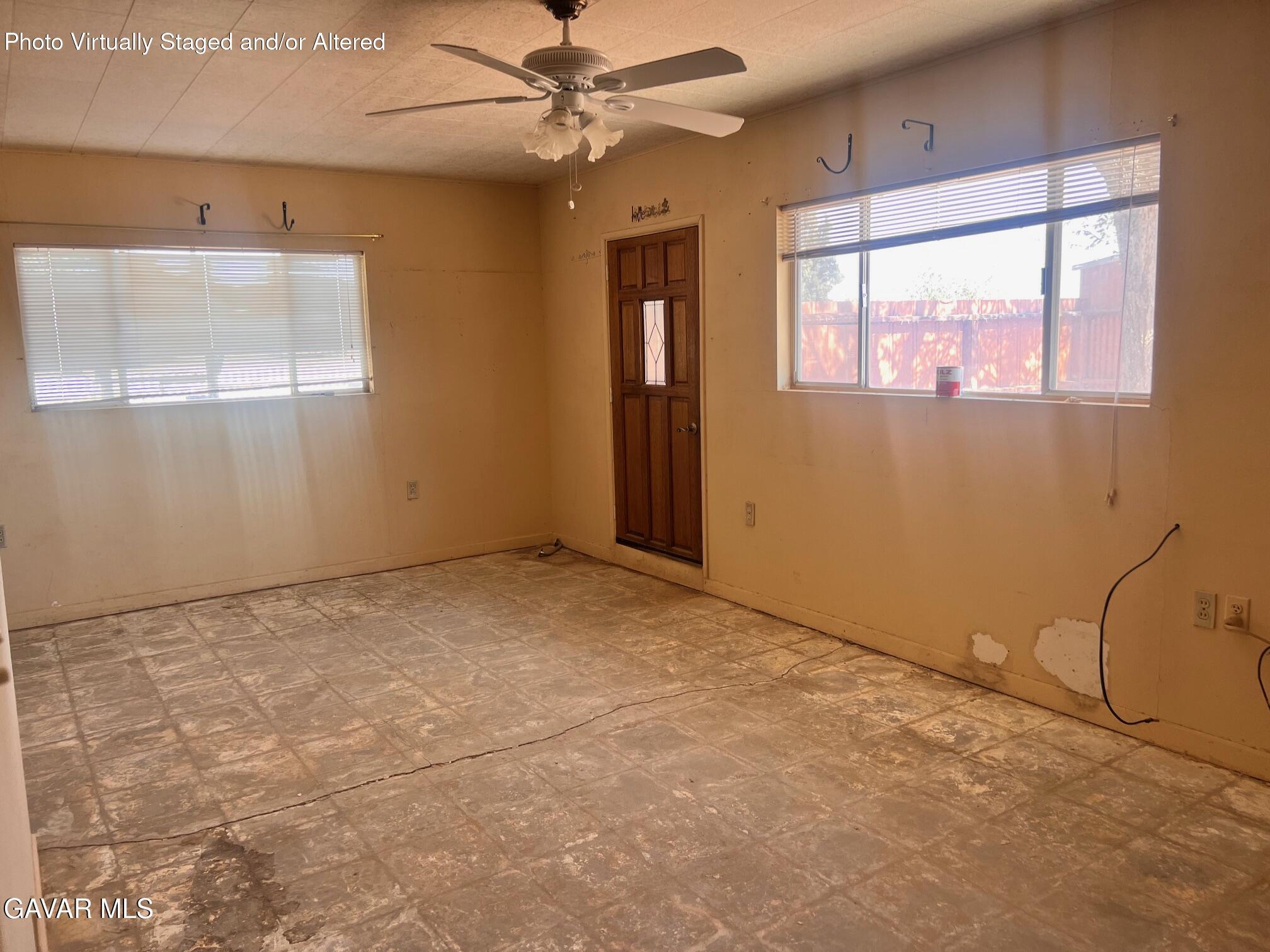 13227 Flint Street North Edwards, CA 93523 - Photo 64 of 84 an empty room with windows and fan
