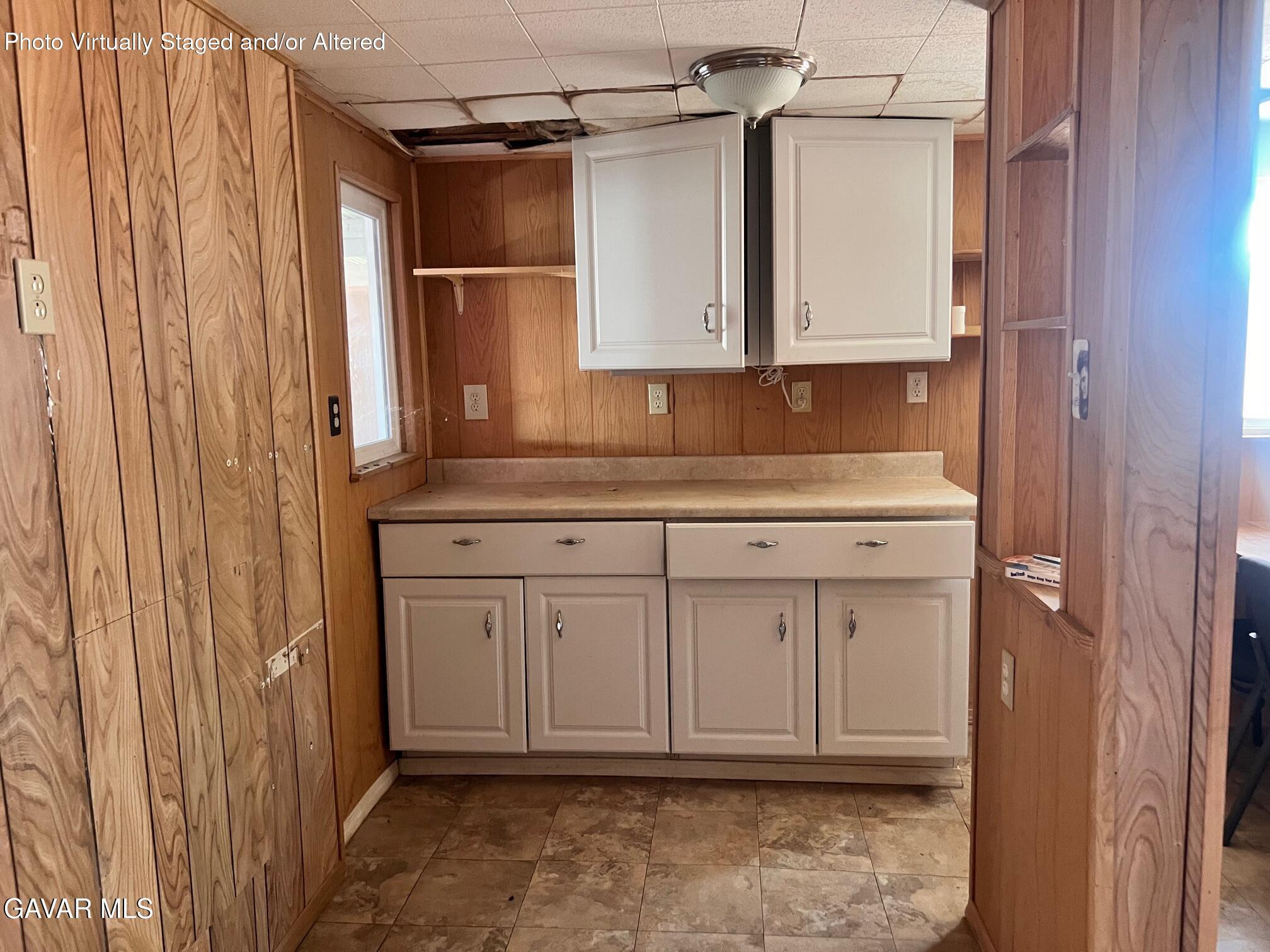 13227 Flint Street North Edwards, CA 93523 - Photo 65 of 84 a view of a kitchen with white cabinets