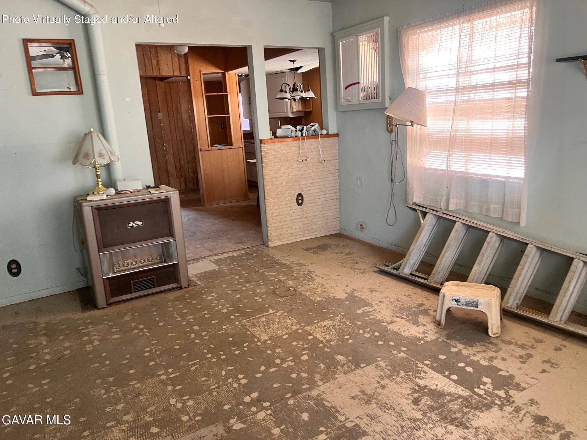 13227 Flint Street North Edwards, CA 93523 - Photo 74 of 84 a living room with furniture and a window