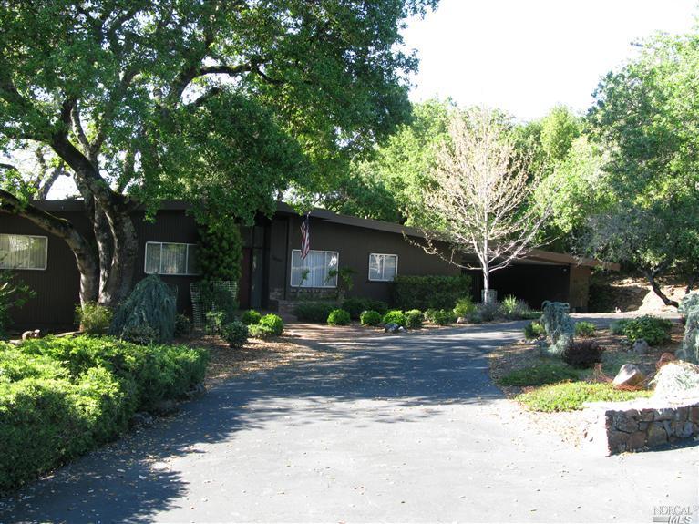3400 Montecito Lane Santa Rosa, CA 95404 - Photo 1 of 1 a front view of a house with a yard
