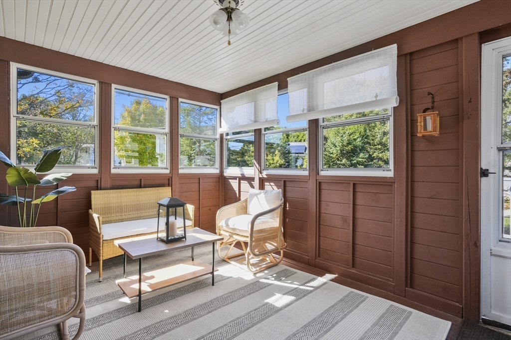 35 Blackman Road Canton, MA 02021 - Photo 15 of 26 a living room with furniture large windows and wooden floor