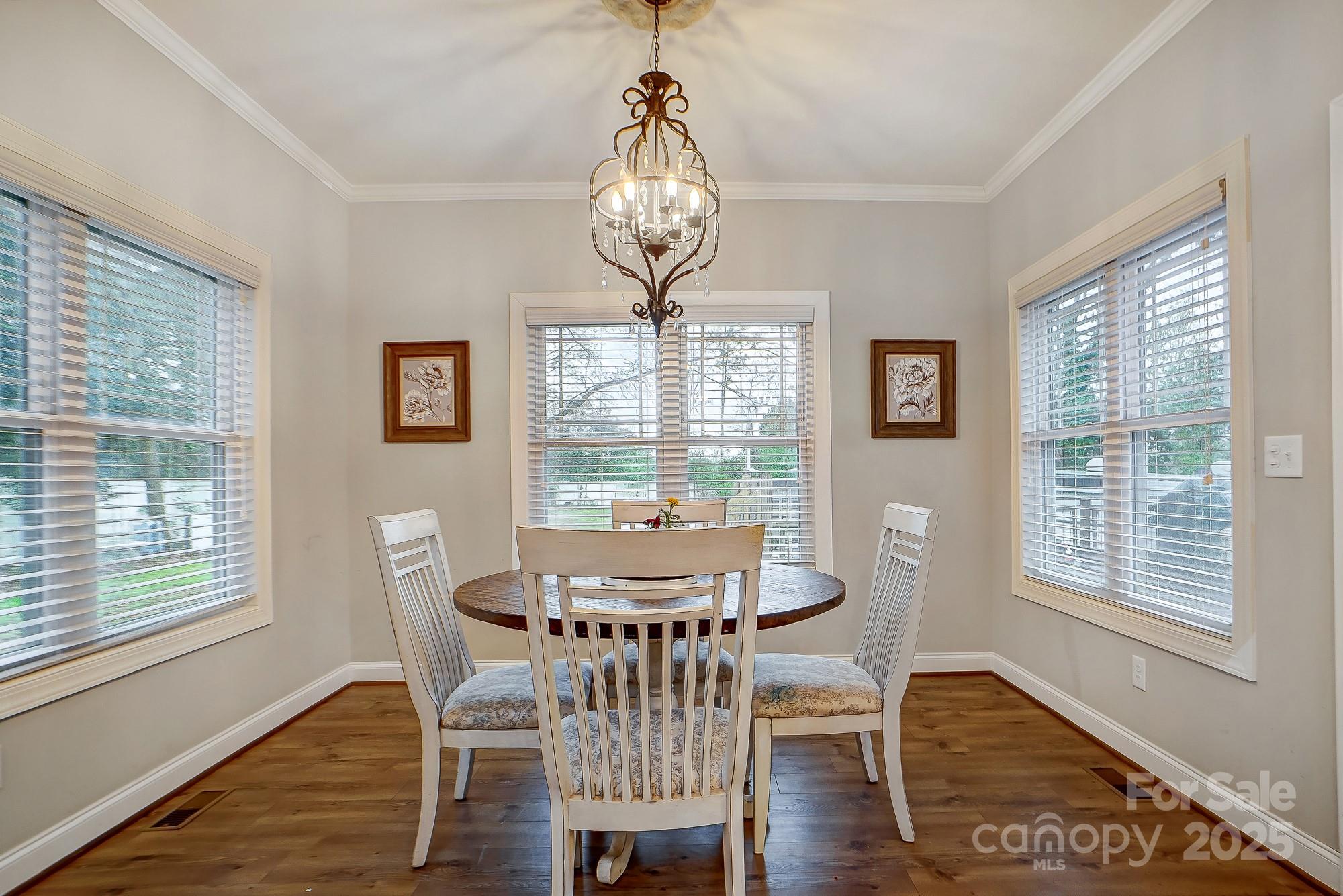 125 Jefferson Drive Locust, NC 28097 - Photo 14 of 27 a view of a dining room with furniture window and wooden floor