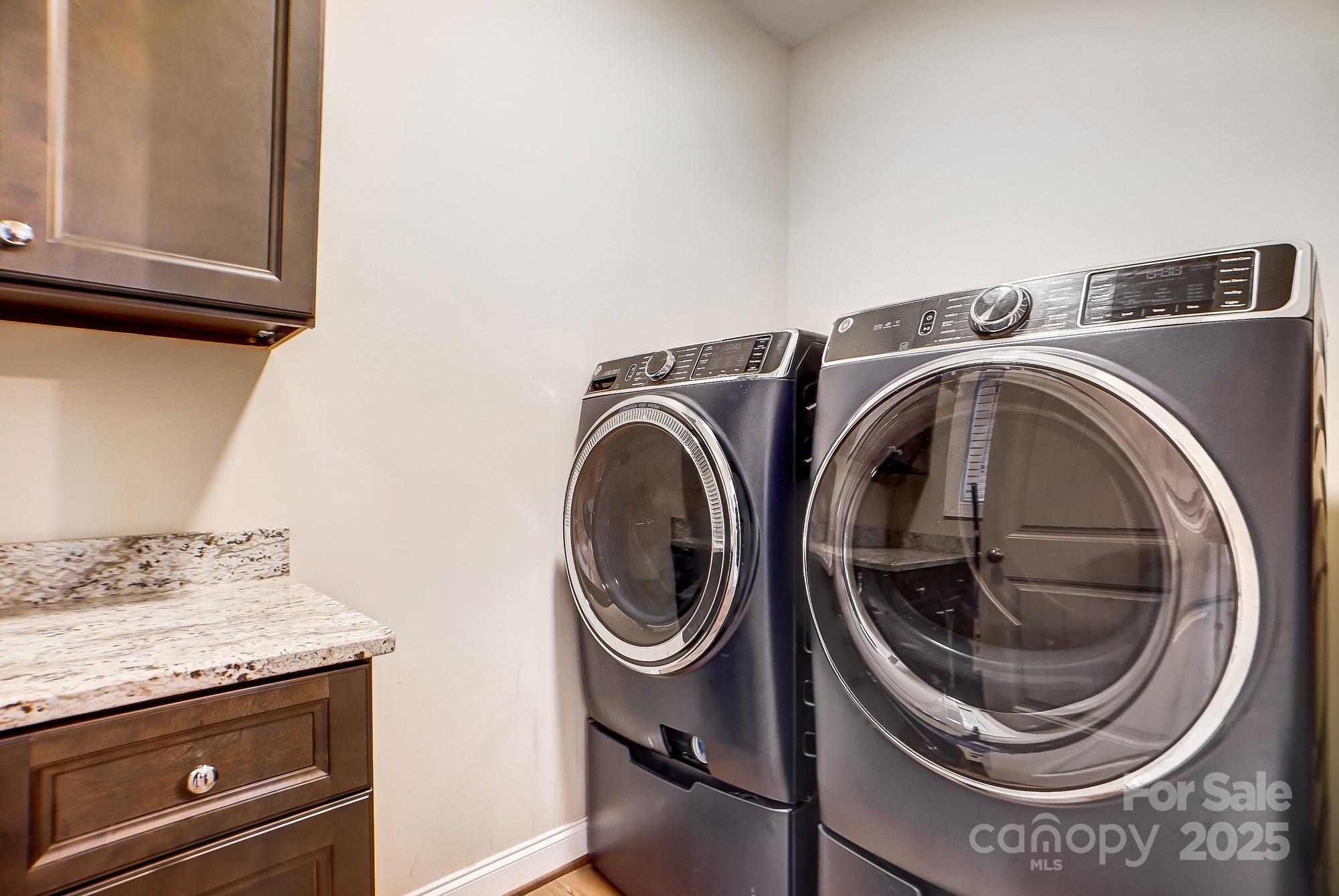 125 Jefferson Drive Locust, NC 28097 - Photo 24 of 27 a close up view of washer and dryer