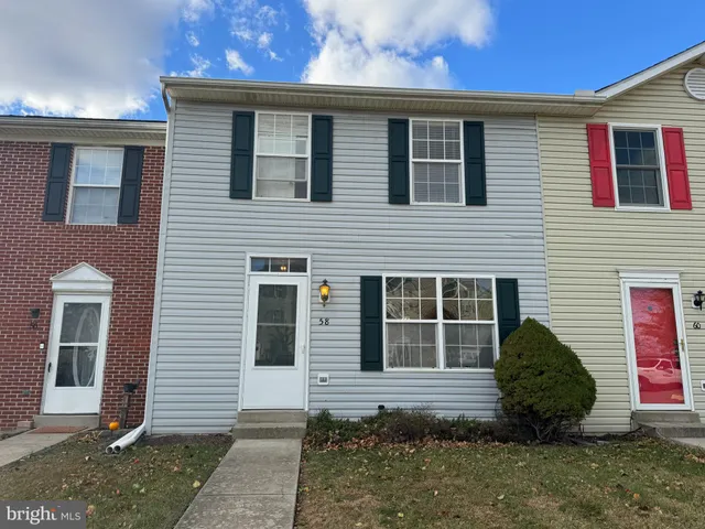 a view of a back yard of the house