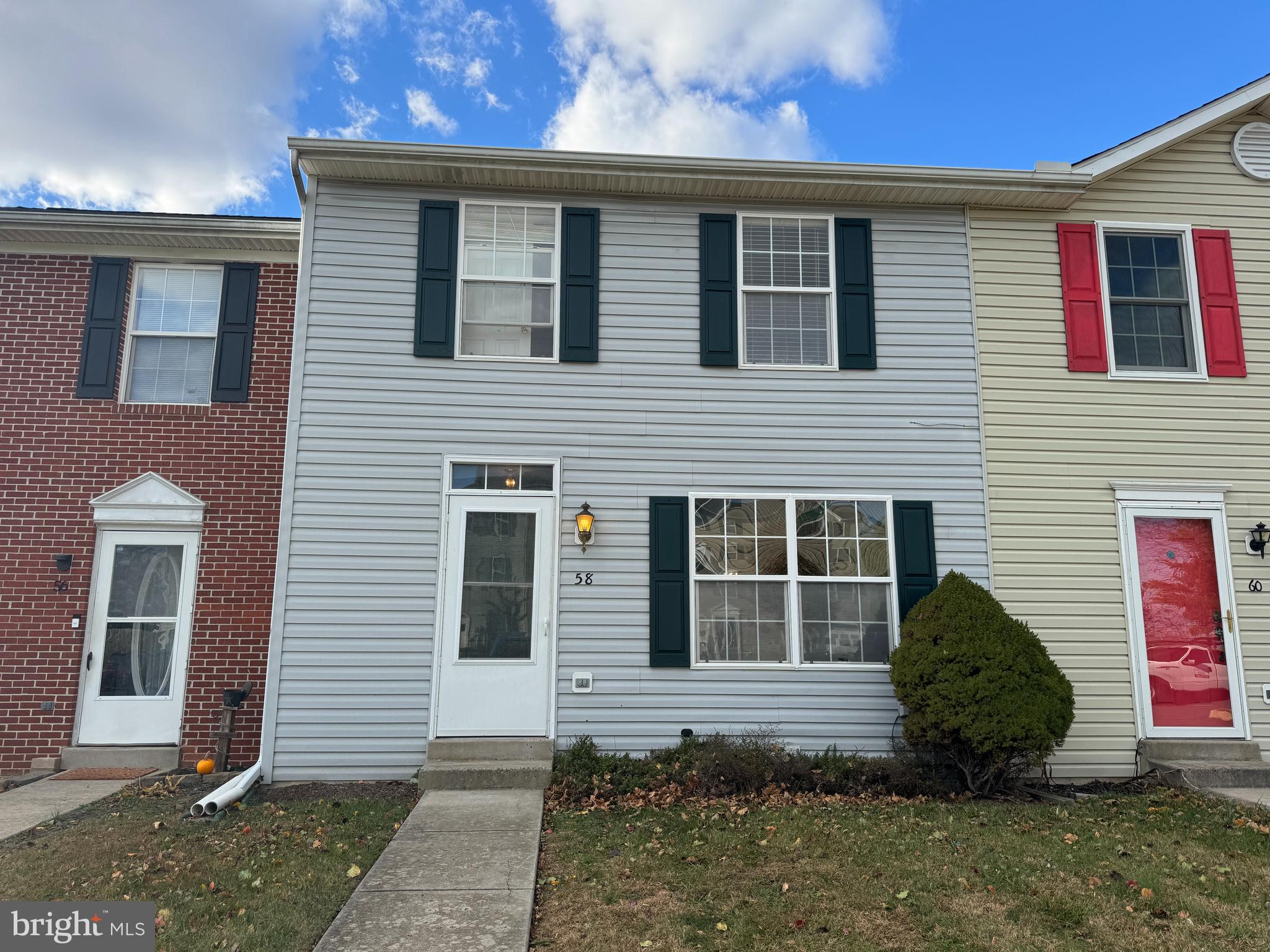 a view of a back yard of the house