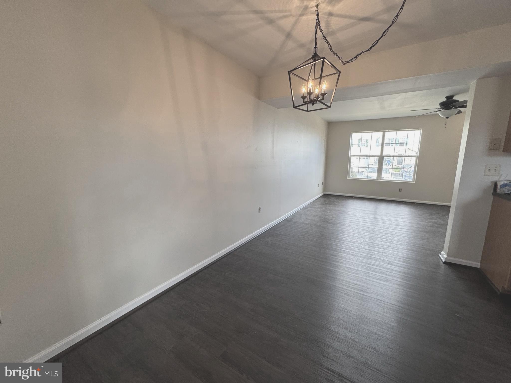 58 North Gala Littlestown, PA 17340 - Photo 2 of 10 an empty room with wooden floor and windows