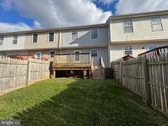a view of backyard with deck
