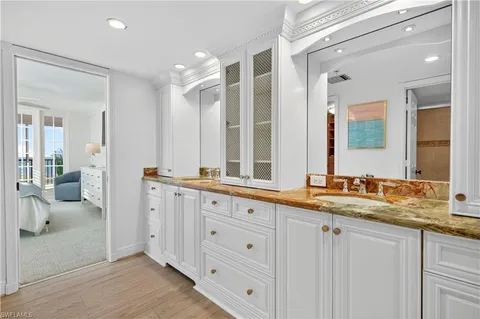 a living room with furniture potted plant and a window