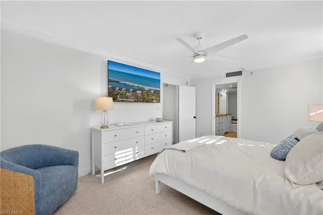 a bathroom with double sink and a mirror