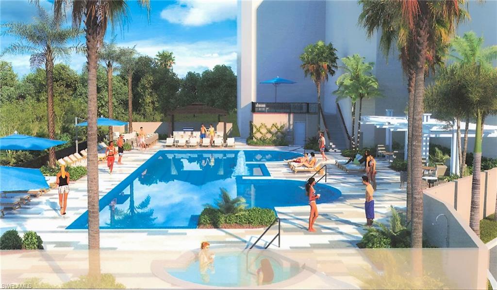 6573 Marissa Loop, Unit 2004 Naples, FL 34108 - Photo 15 of 30 a view of a swimming pool with a patio