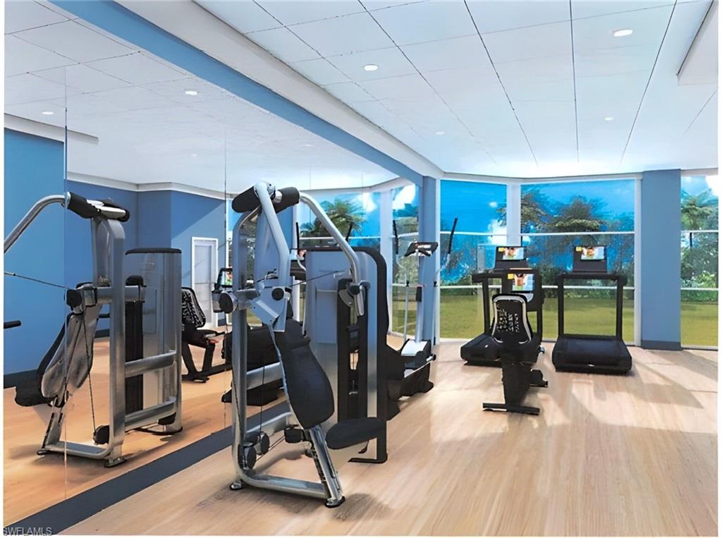 6573 Marissa Loop, Unit 2004 Naples, FL 34108 - Photo 19 of 30 a view of a room with gym equipment
