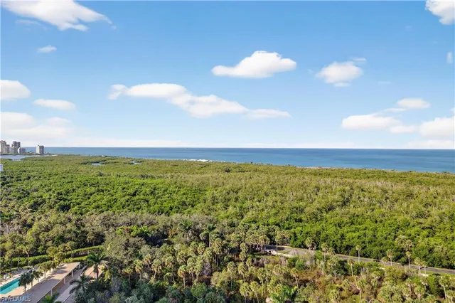 a view of a building with a yard
