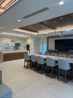 a room with furniture and a large window