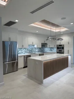 a outdoor space with table and chairs