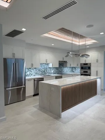 a outdoor space with table and chairs