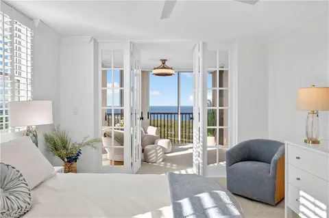 a kitchen with a sink appliances and cabinets