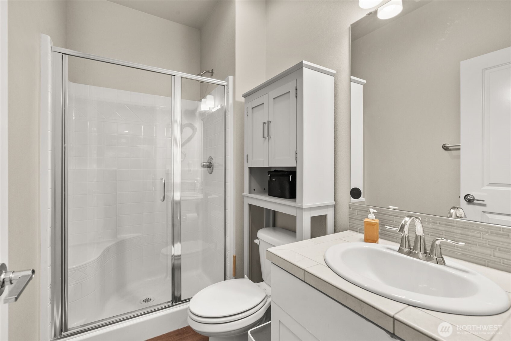 351 South Sergeant Street Buckley, WA 98321 - Photo 16 of 36 a bathroom with a sink a toilet and shower