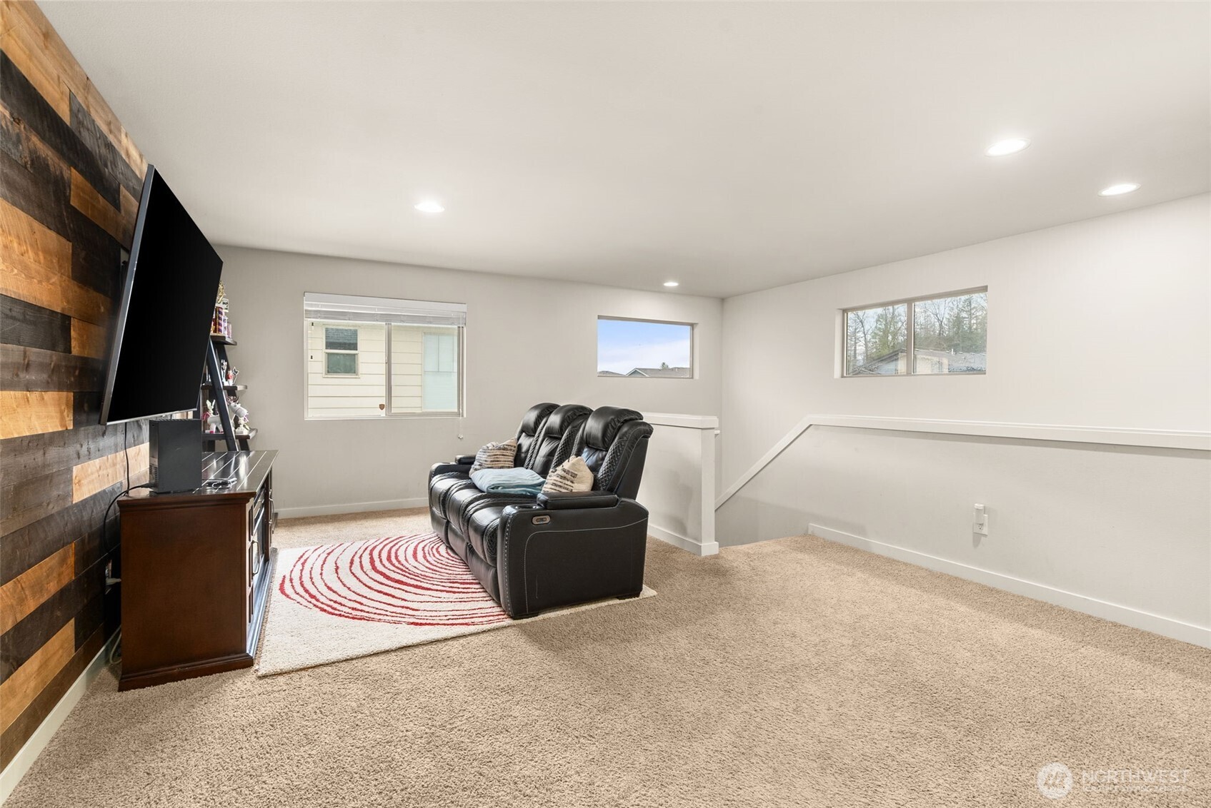 351 South Sergeant Street Buckley, WA 98321 - Photo 17 of 36 a living room with furniture a flat screen tv and a window
