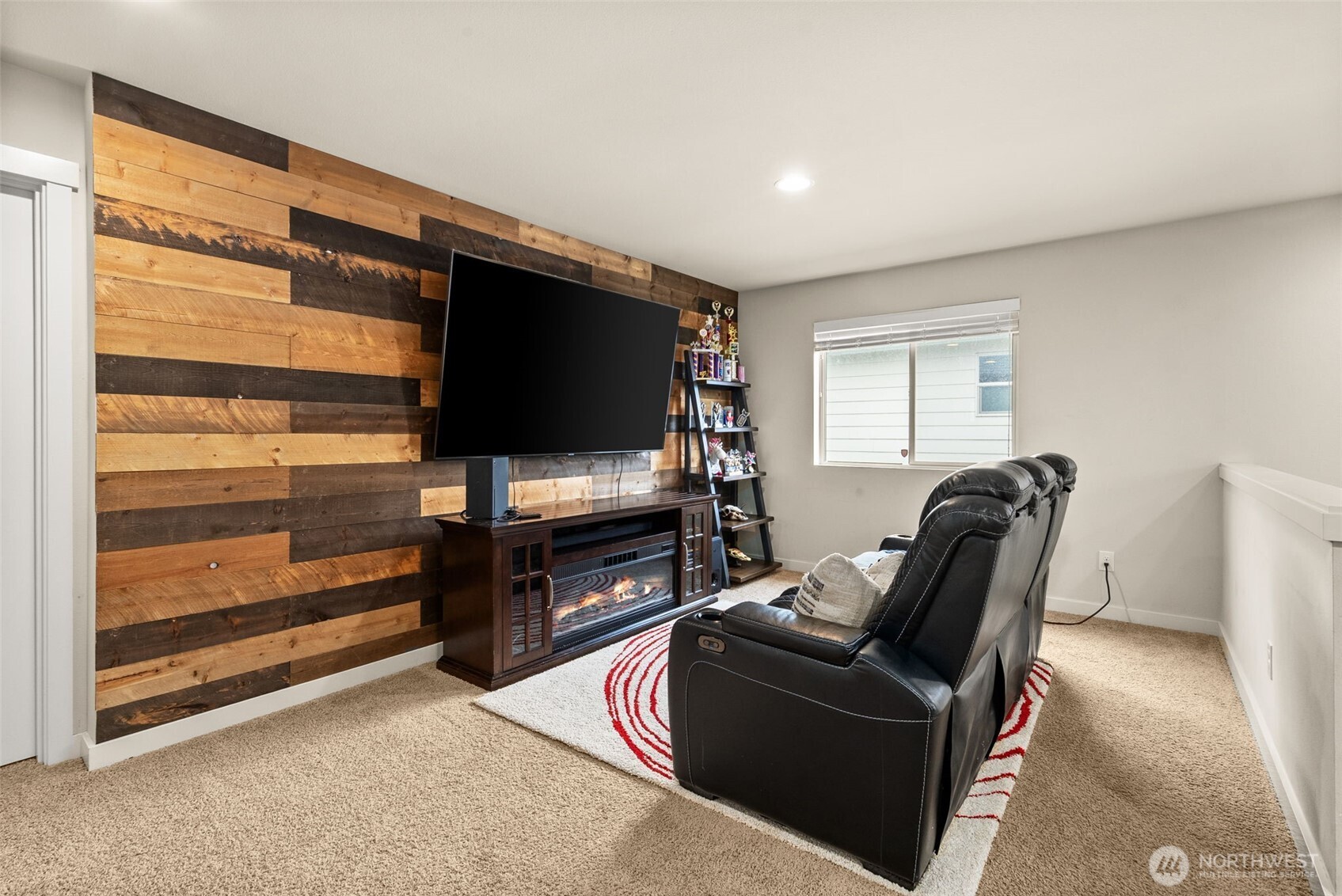 351 South Sergeant Street Buckley, WA 98321 - Photo 18 of 36 a living room with furniture and a flat screen tv