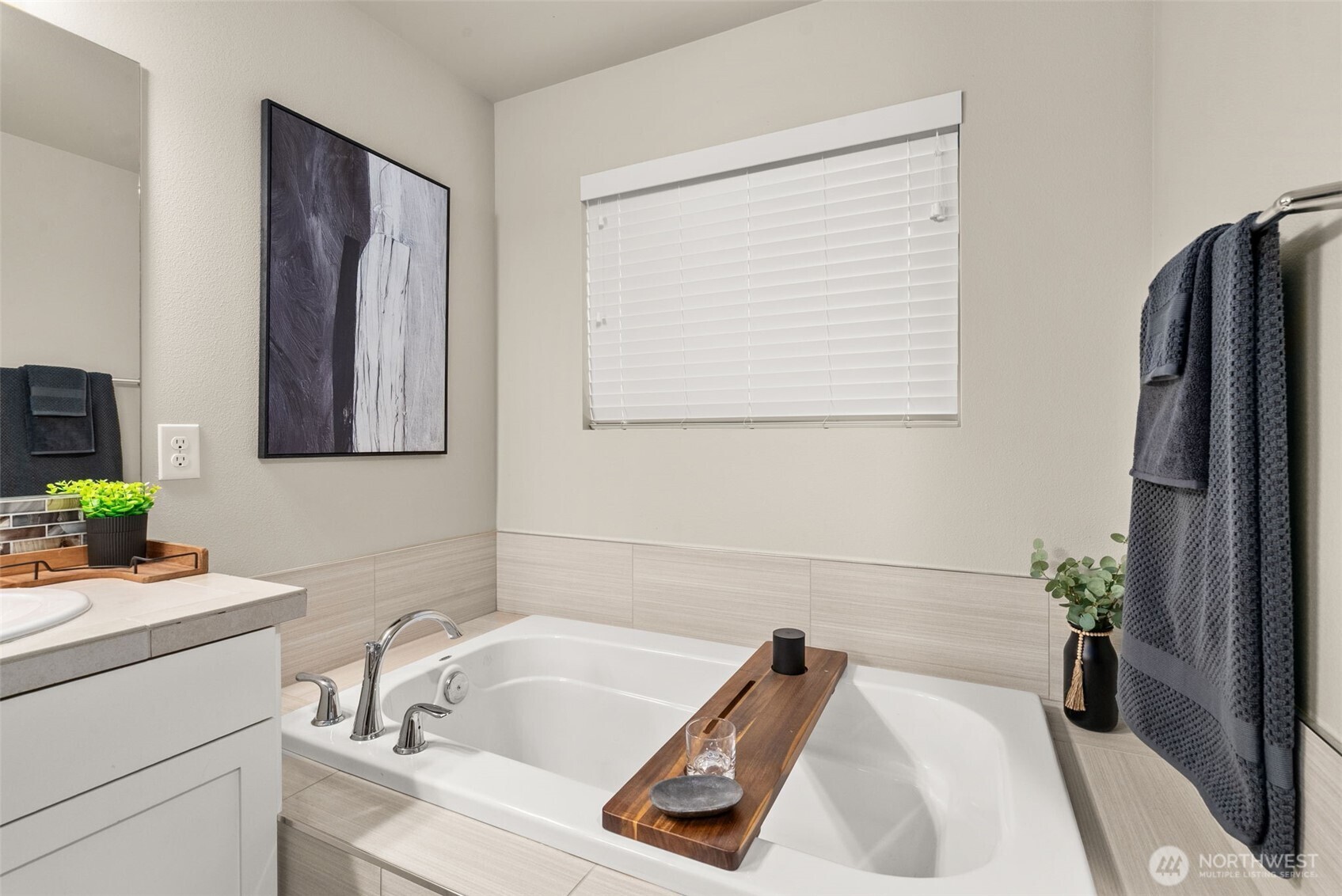 351 South Sergeant Street Buckley, WA 98321 - Photo 22 of 36 a bathroom with a tub sink and mirror