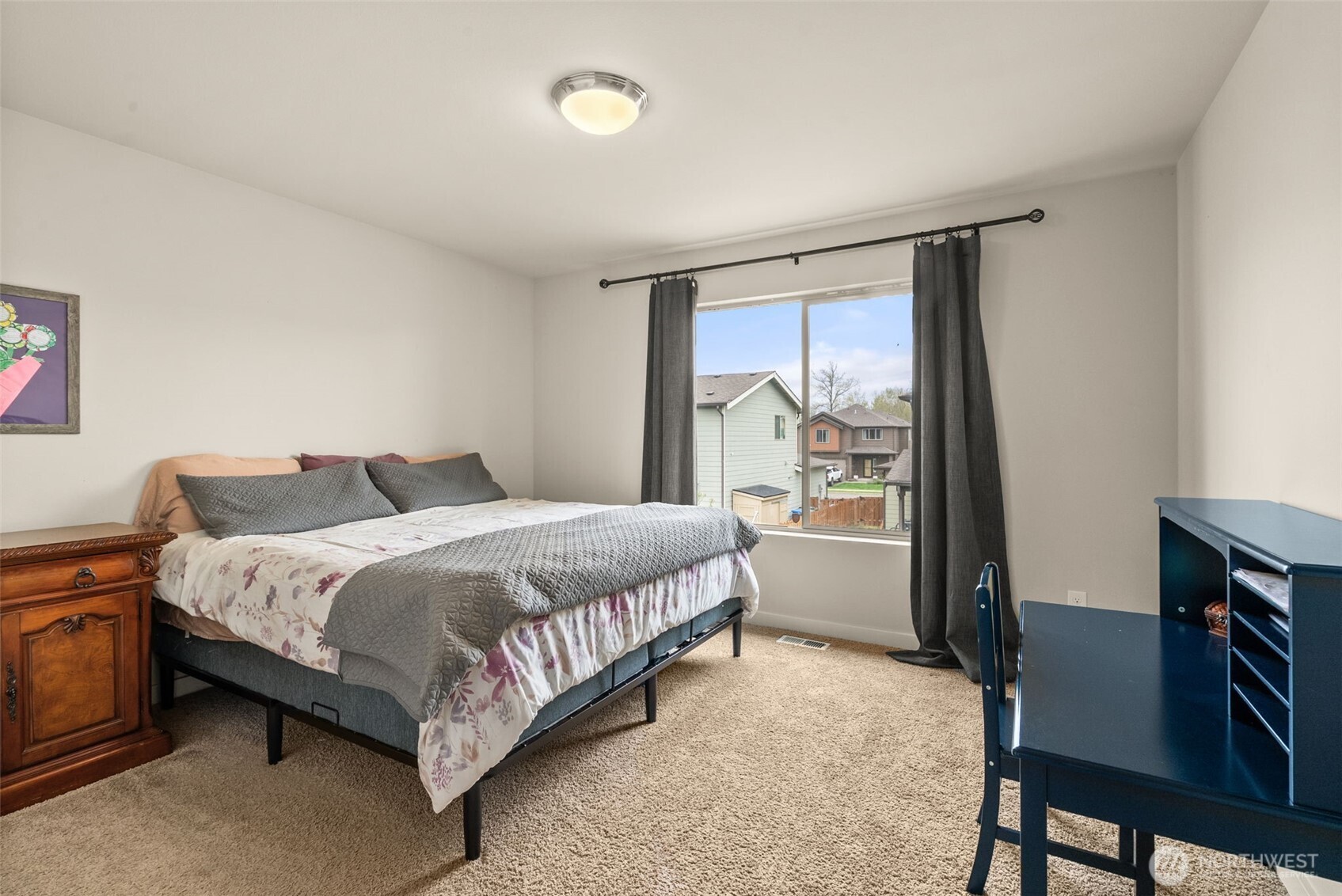351 South Sergeant Street Buckley, WA 98321 - Photo 23 of 36 a bedroom with a bed and a window