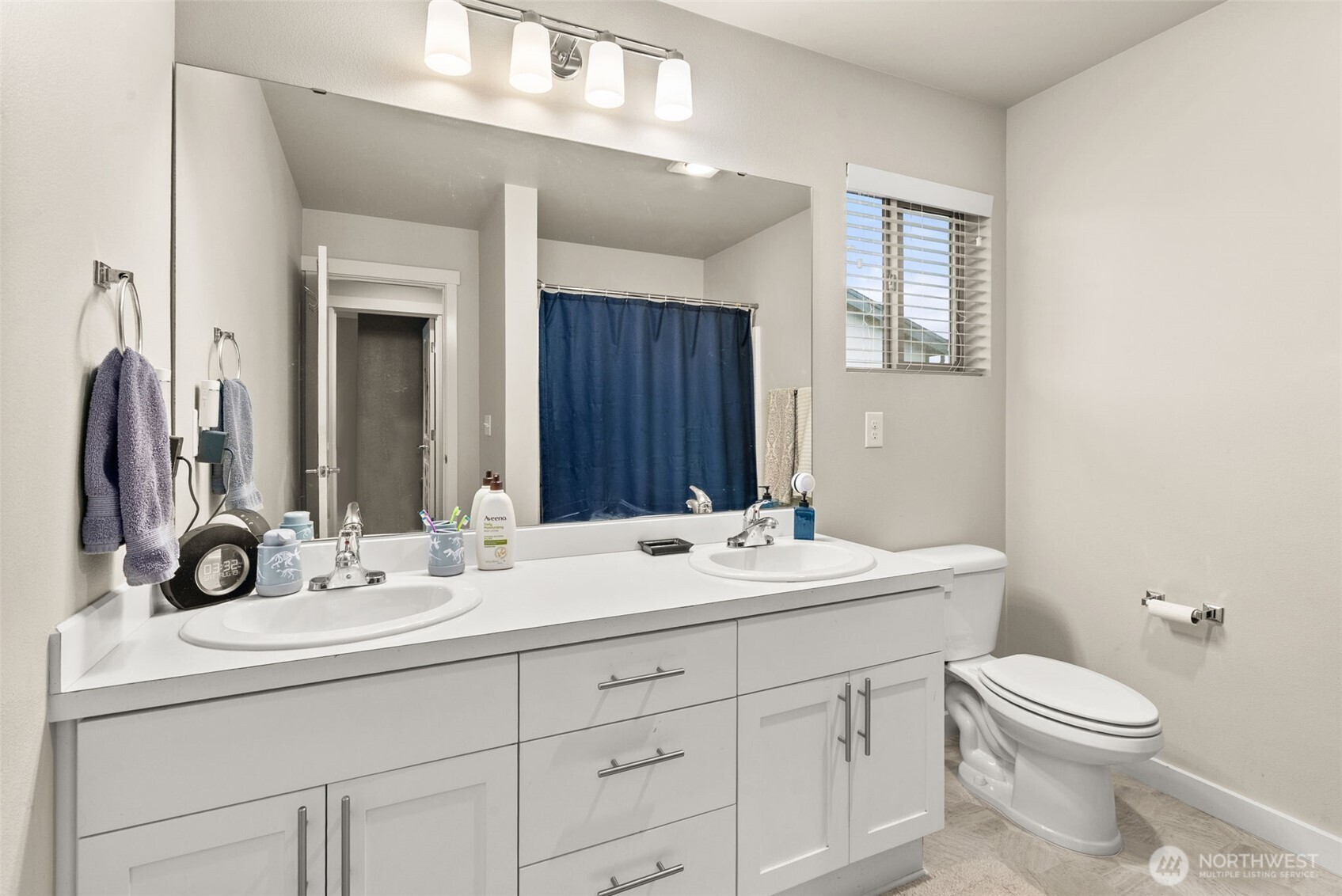 351 South Sergeant Street Buckley, WA 98321 - Photo 24 of 36 a bathroom with a double vanity sink toilet and a mirror