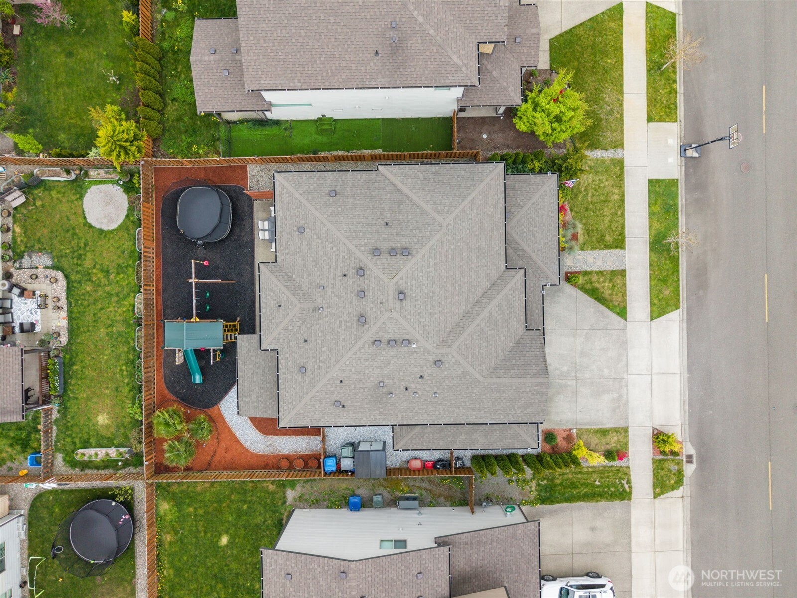 351 South Sergeant Street Buckley, WA 98321 - Photo 35 of 36 an aerial view of a house with a yard and potted plants