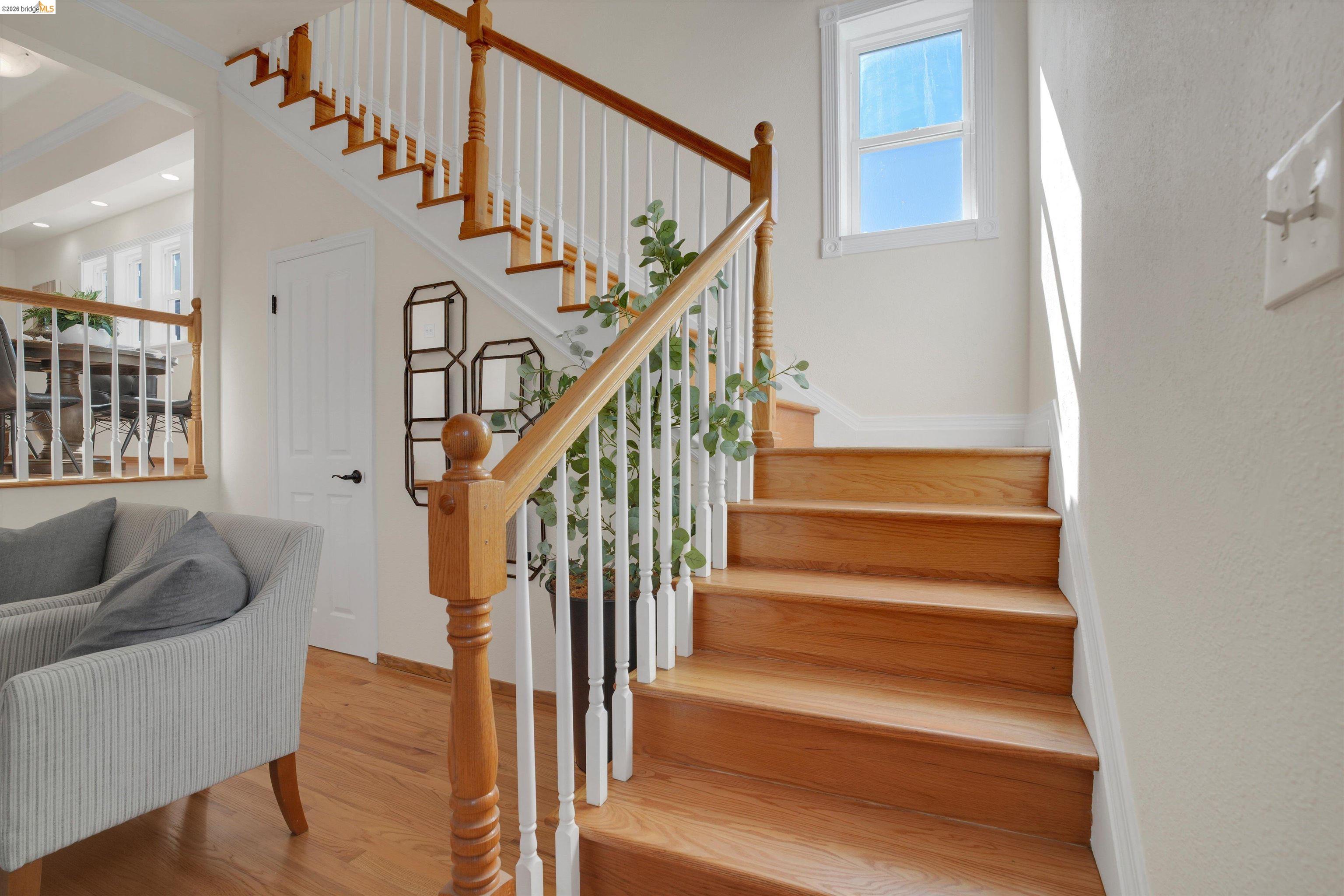 1821 Grand Street Alameda, CA 94501 - Photo 25 of 32 Stairs featuring wood finished floors and plenty of natural light