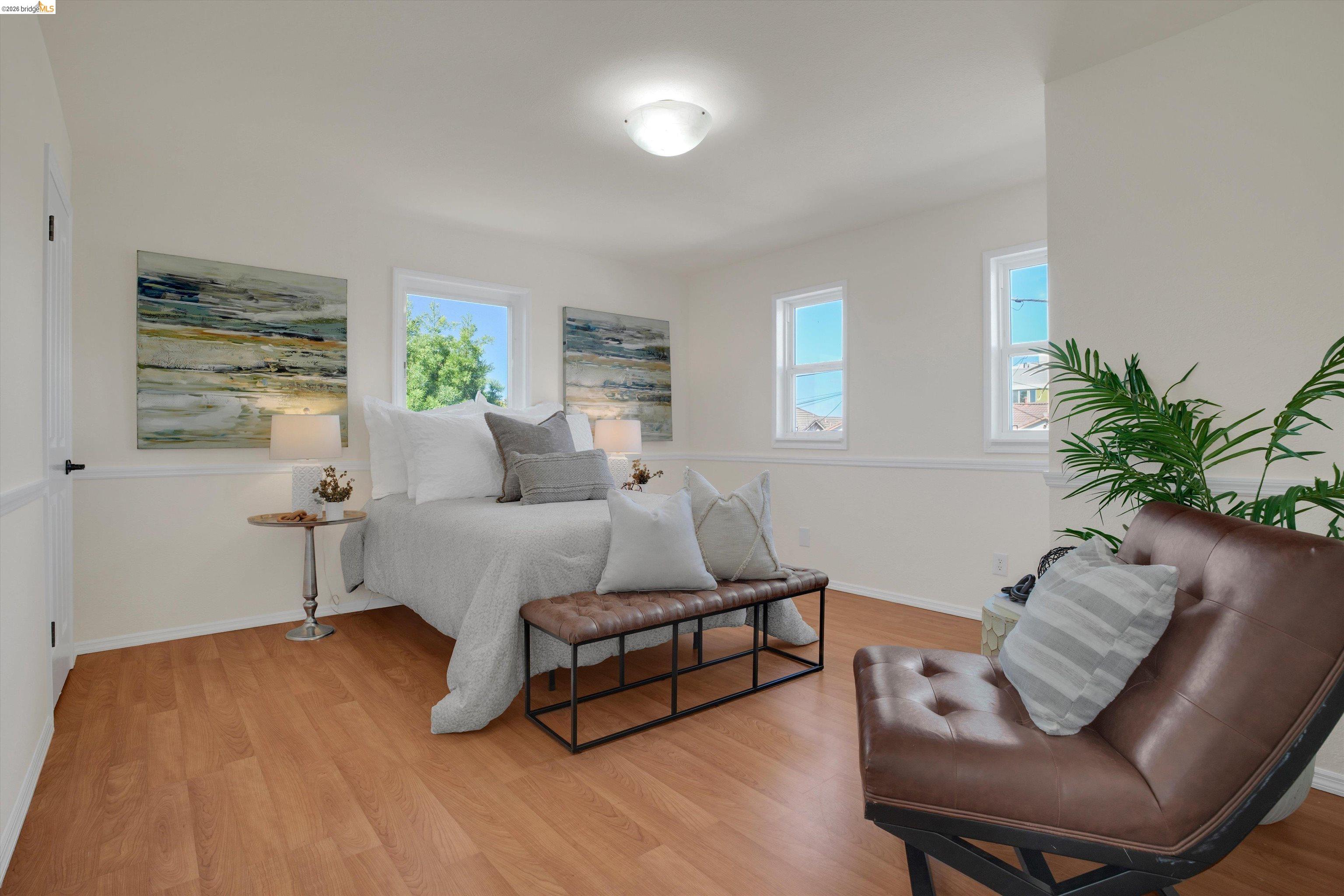 1821 Grand Street Alameda, CA 94501 - Photo 27 of 32 Bedroom with multiple windows and light wood-type flooring