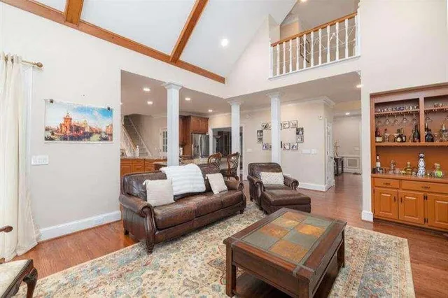 a bathroom with a sink vanity granite and toilet