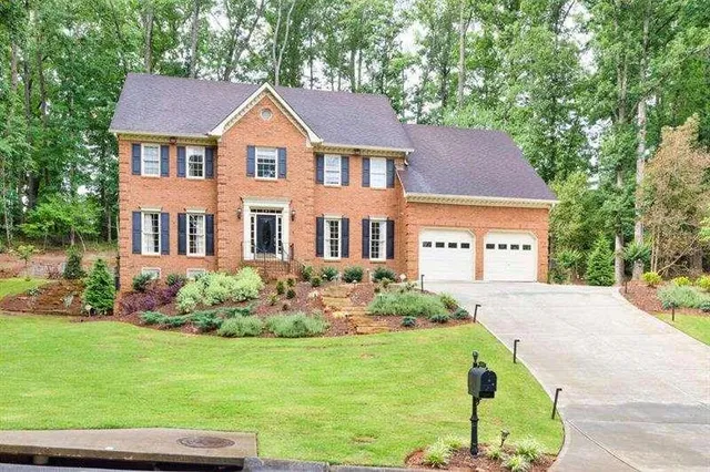 a view of outdoor space with signage and flags
