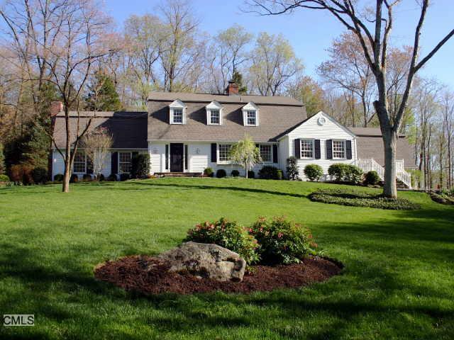 19 Norfield Road Weston, CT 06883 - Photo 1 of 1 a front view of a house with a garden