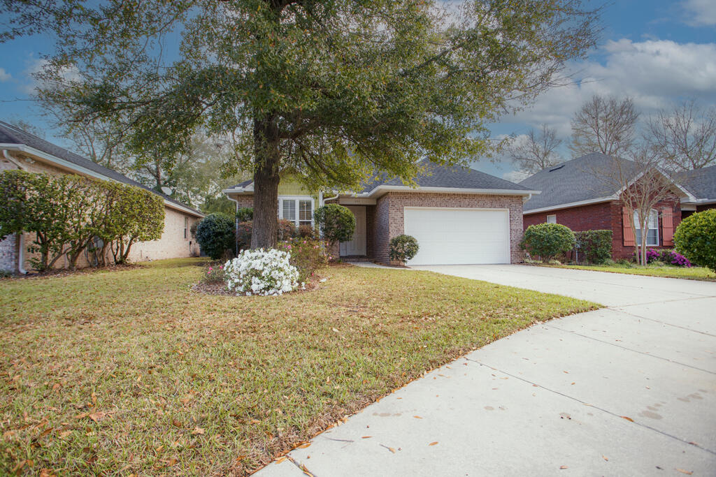 111 Arrowhead Way Niceville, FL 32578 - Photo 1 of 46 a view of a house with a yard