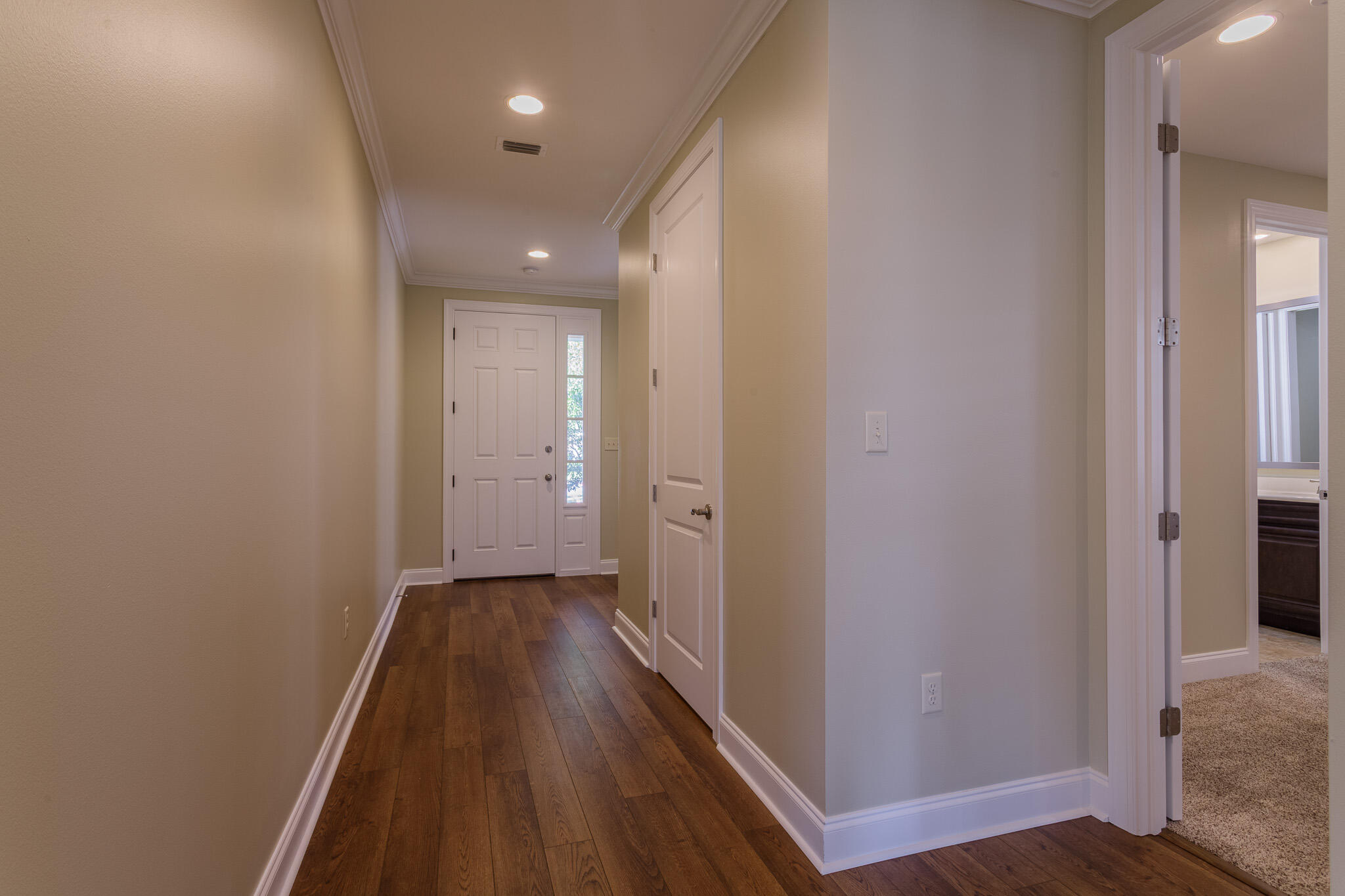 111 Arrowhead Way Niceville, FL 32578 - Photo 17 of 46 a view of a hallway with wooden floor