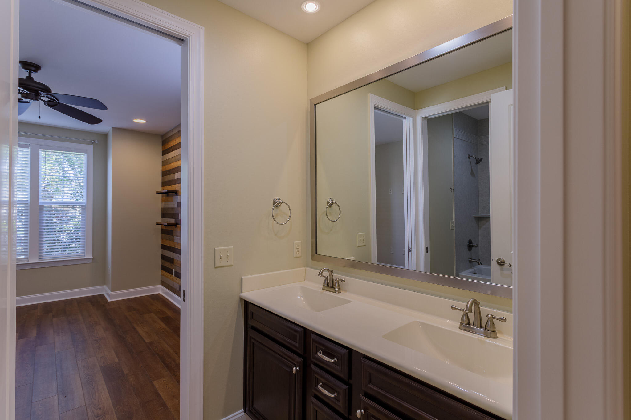 111 Arrowhead Way Niceville, FL 32578 - Photo 27 of 46 a bathroom with a sink a vanity and a mirror