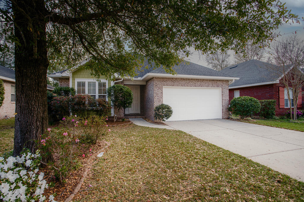 111 Arrowhead Way Niceville, FL 32578 - Photo 30 of 46 front view of a house with a yard