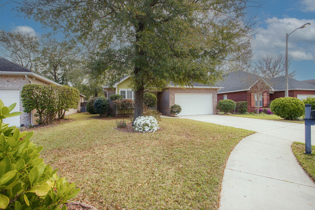 111 Arrowhead Way Niceville, FL 32578 - Photo 37 of 46 a view of a house with a yard