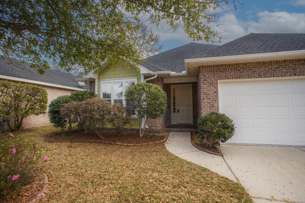 111 Arrowhead Way Niceville, FL 32578 - Photo 39 of 46 front view of a house with a yard