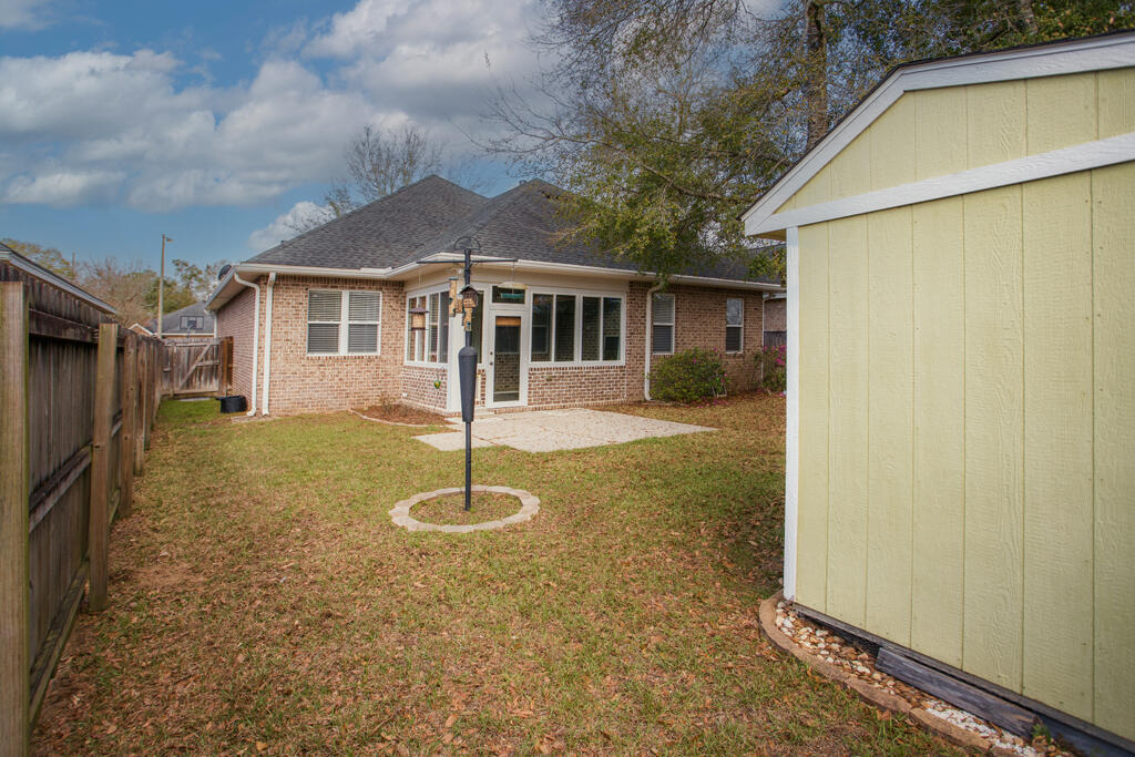 111 Arrowhead Way Niceville, FL 32578 - Photo 42 of 46 a front view of a house with a yard