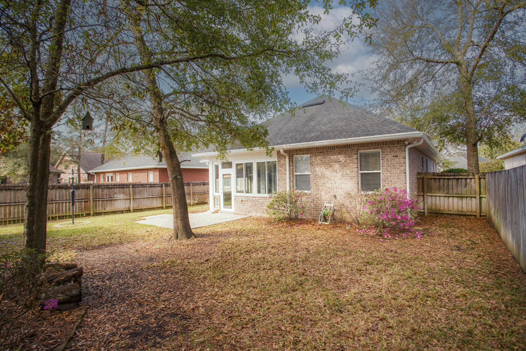 111 Arrowhead Way Niceville, FL 32578 - Photo 45 of 46 a view of a house with a yard and tree