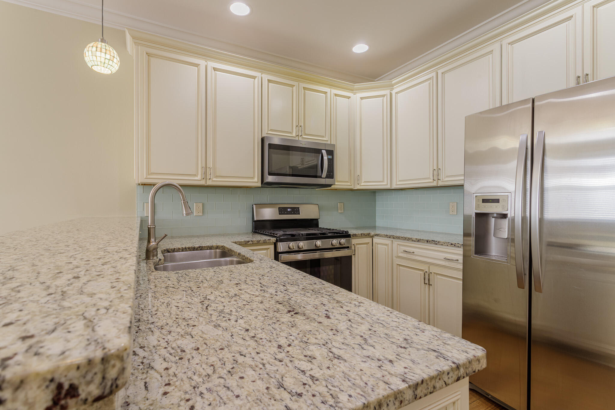 111 Arrowhead Way Niceville, FL 32578 - Photo 9 of 46 a kitchen with stainless steel appliances granite countertop a refrigerator stove top oven and sink