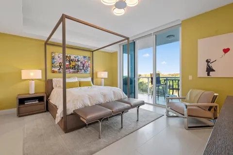 a bed room with a bed and a couch